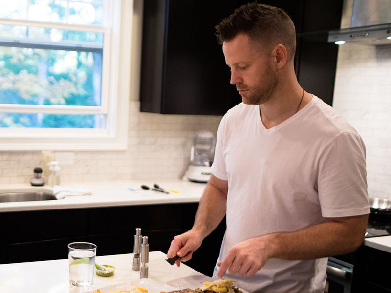 man in his kitchen