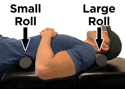 Man lying on back with two different sized foam rollers for thoracic spine mobilization exercise.