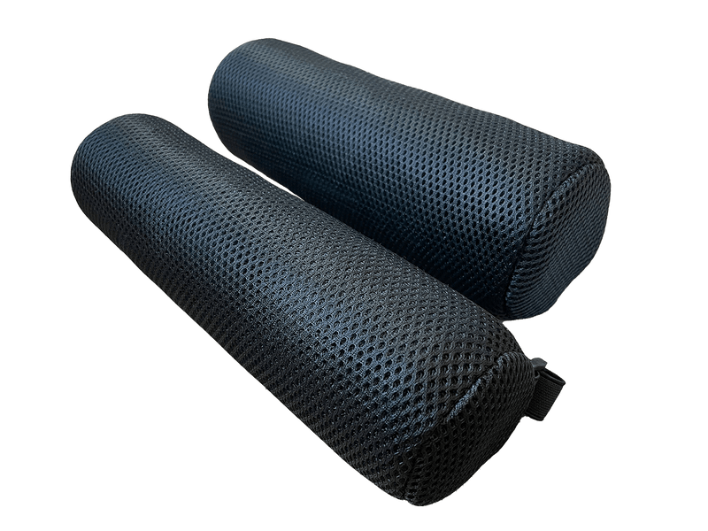 Two black foam rollers for fitness and physical therapy on black background