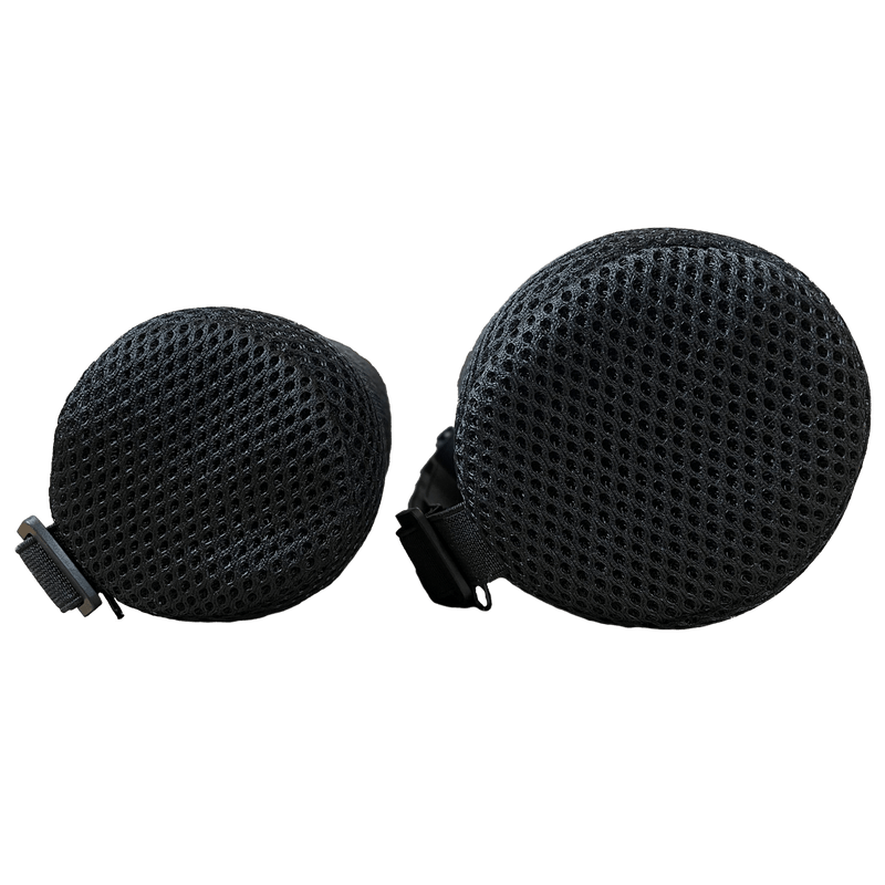 black foam microphone windshields on black background