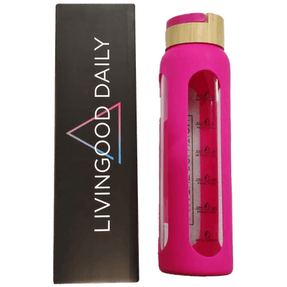 Livingood Daily branded pink water bottle next to packaging box